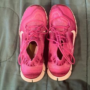 pink nike frees